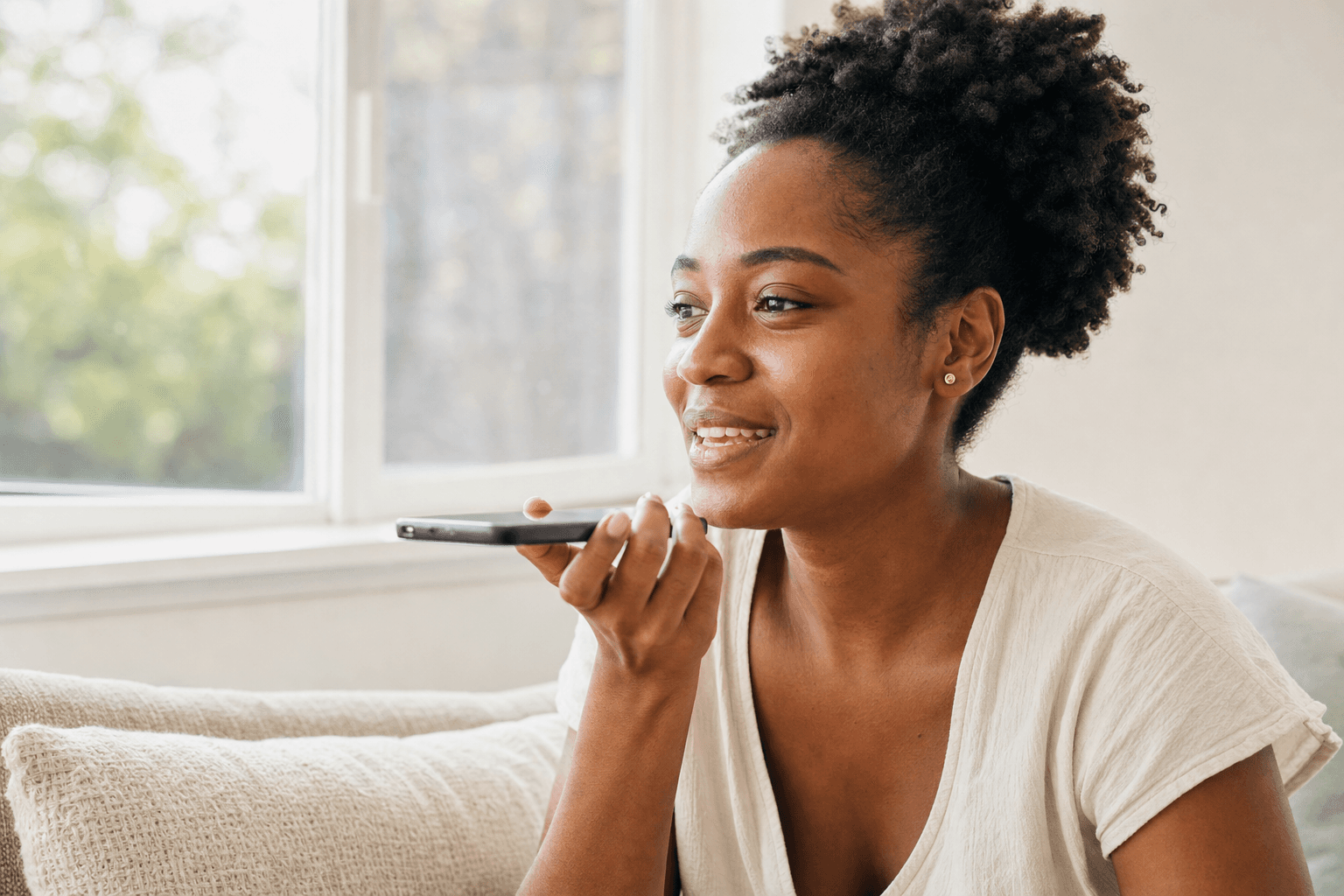 A contributor recording a voice task on her phone